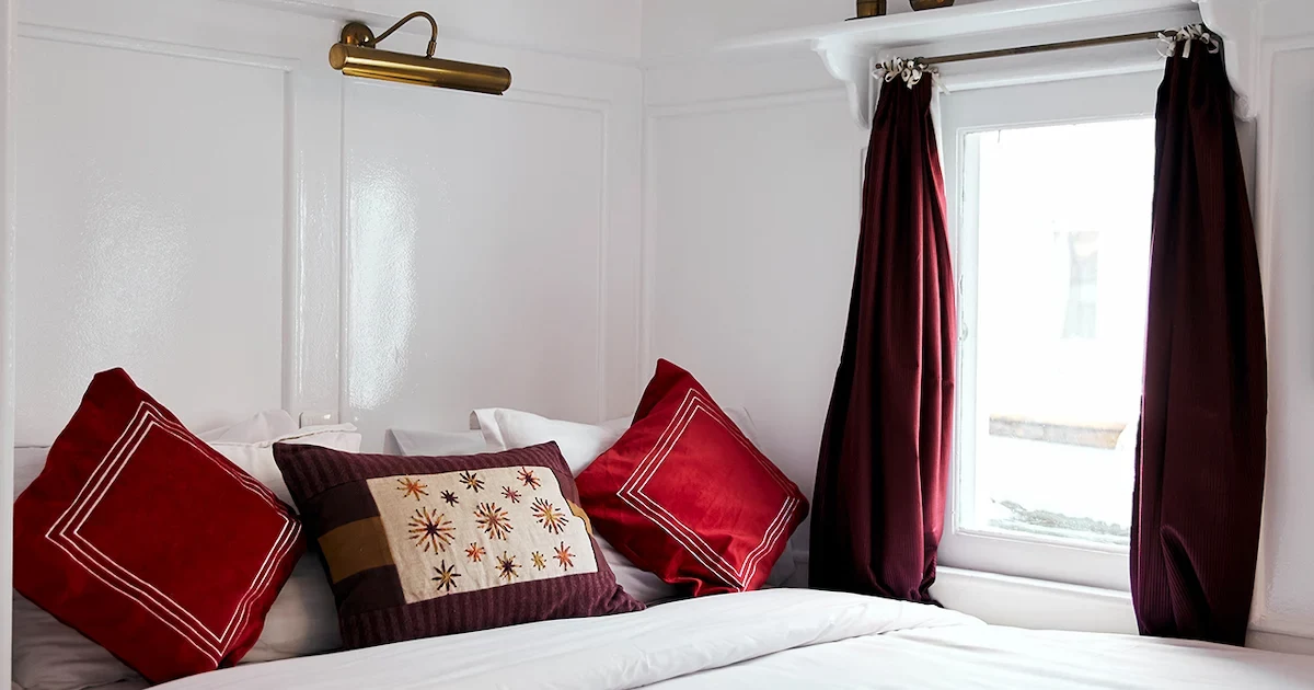 Meticulously decorated cabin or suite interior on the Gordon Pacha Dahabiya.
