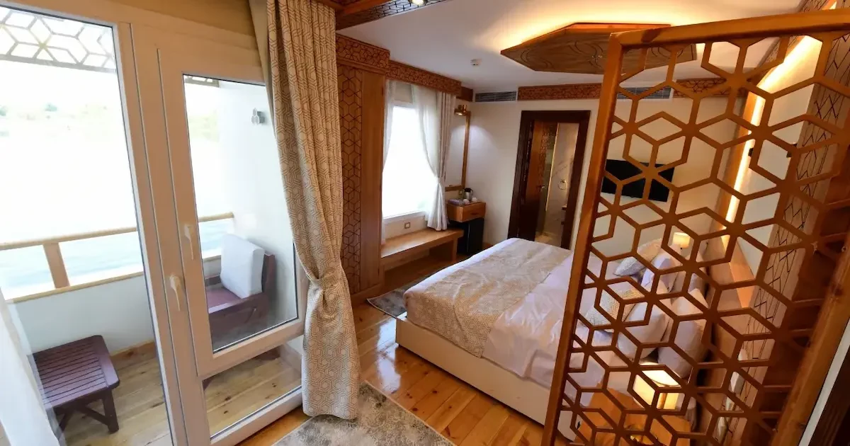 Elegant cabin interior aboard Azhar Dahabiya