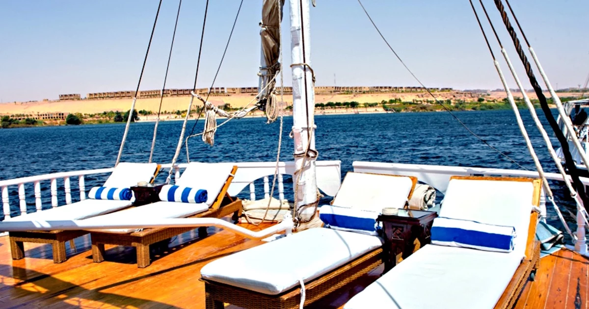 Sunset dining on deck of Dahabiya Nile Cruise