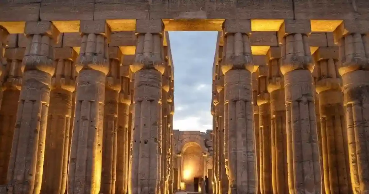Luxor Temple illuminated at night during Nile cruise from Cairo