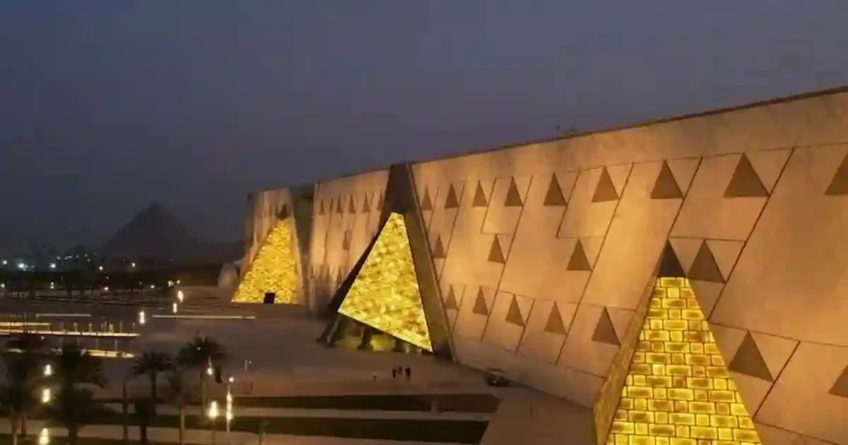 Grand Egyptian Museum exterior near Giza pyramids