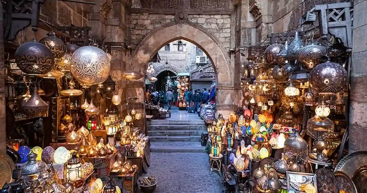 Busy Cairo street market at night