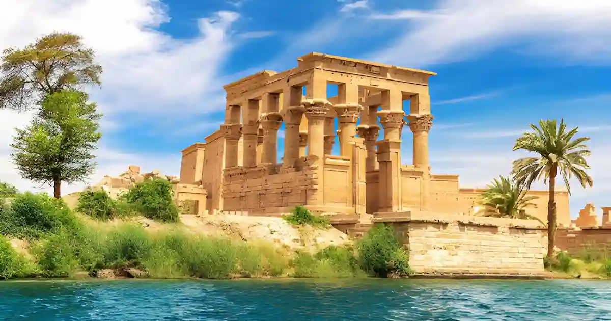 Philae Temple dedicated to Isis on Agilkia Island at sunset in Aswan, Egypt